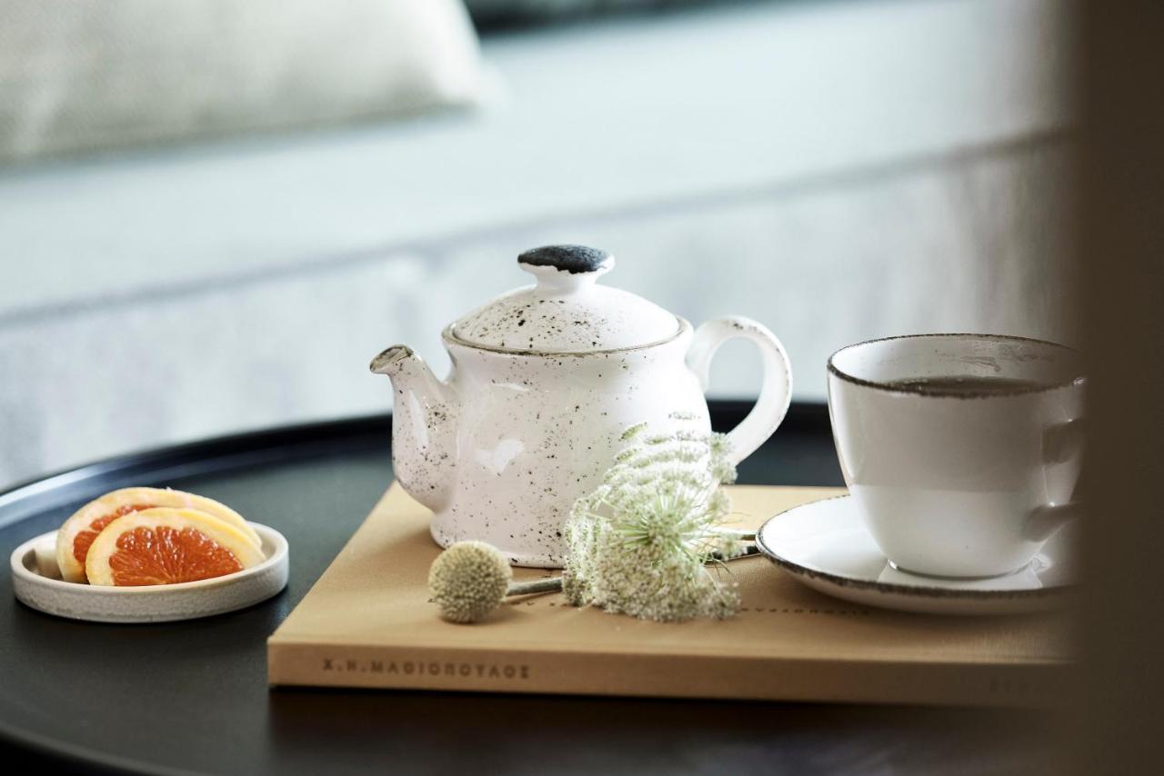 Helea Lifestyle Beach Resort Kallithea  ภายนอก รูปภาพ Teapot and cup