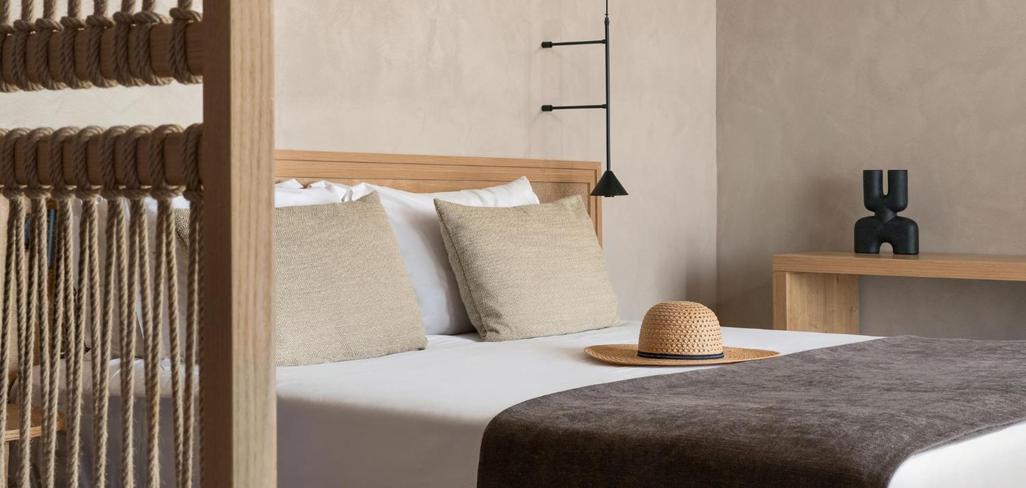 Helea Lifestyle Beach Resort Kallithea  ภายนอก รูปภาพ A bed with a straw hat