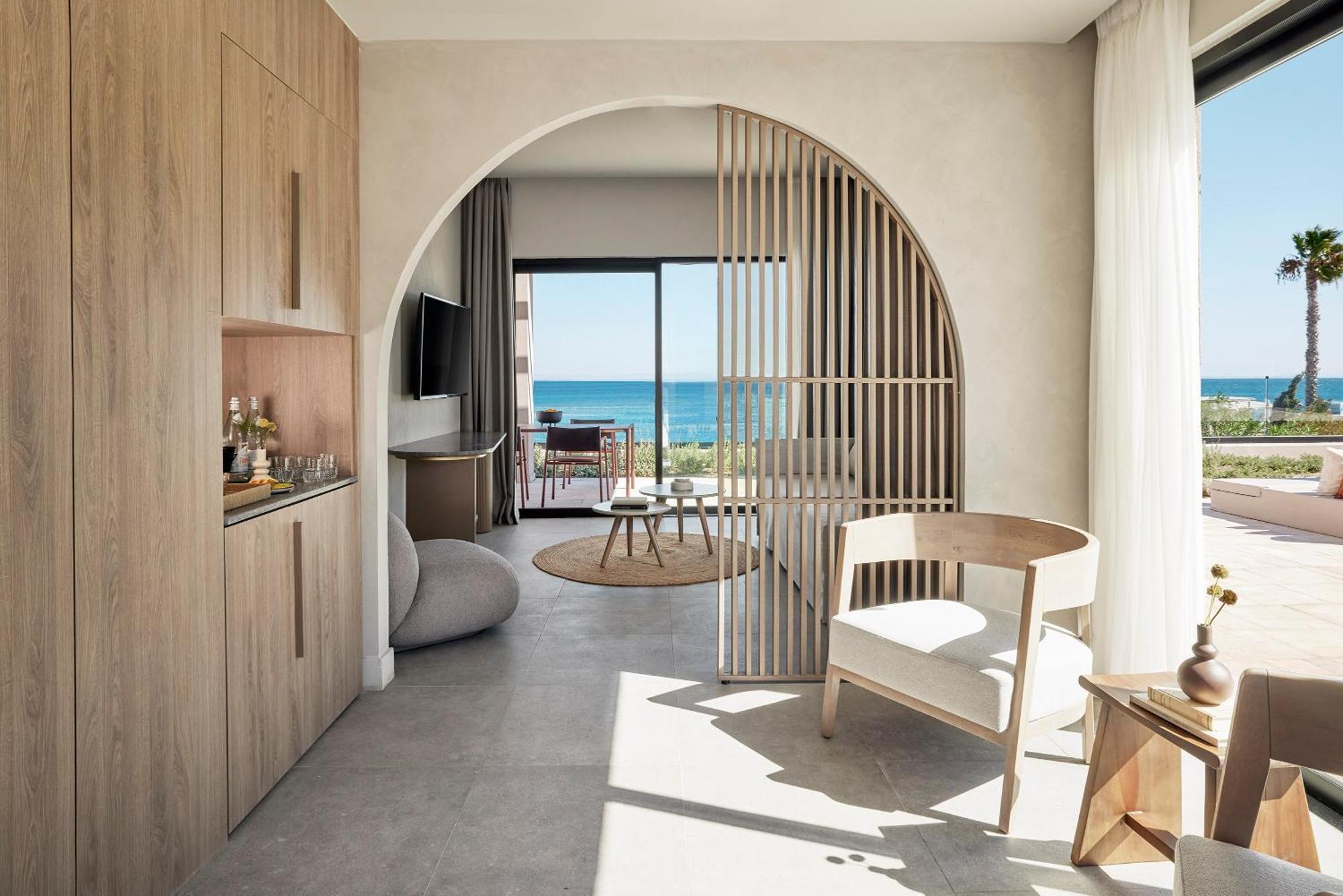 Helea Lifestyle Beach Resort Kallithea  ห้อง รูปภาพ Interior of a suite at the hotel